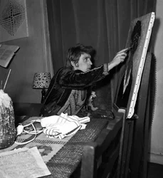 French Singer Christophe (Daniel Bevilacqua) painting a canvas at home, 18 November 1969